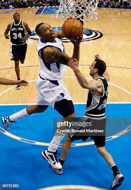 Forward Caron Butler of the Dallas Mavericks takes a shot against Manu Ginobili of the San Antonio Spurs in Game Five of the Western Conference...