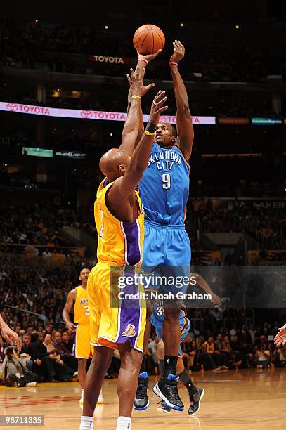 Serge Ibaka of the Oklahoma City Thunder shoots against Lamar Odom of the Los Angeles Lakers in Game Five of the Western Conference Quarterfinals...