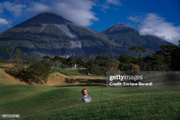 Daniel Miernicki of the United States hits out of a bunker on the 11th hole during the first round of the PGA TOUR Latinoamérica Guatemala Stella...