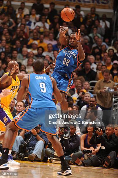 Jeff Green of the Oklahoma City Thunder passes to teammate Serge Ibaka during their game against the Los Angeles Lakers in Game Five of the Western...