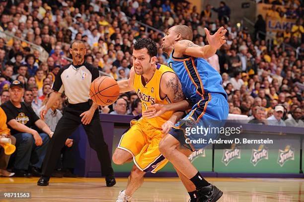 Jordan Farmar of the Los Angeles Lakers drives against Eric Maynor of the Oklahoma City Thunder in Game Five of the Western Conference Quarterfinals...