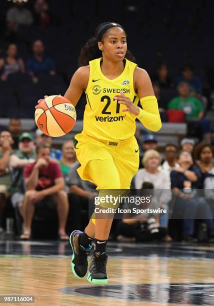 Seattle Storm Guard Jordin Canada caries the ball up court during a WNBA game between the Minnesota Lynx and Seattle Storm on June 26, 2018 at Target...