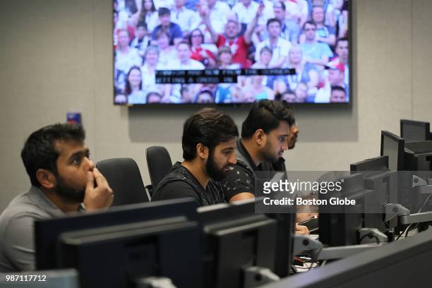 Engineers keep their eyes on World Cup soccer at Akamai in Cambridge, MA on June 28, 2018. Fans around the world are depending on streaming video for...