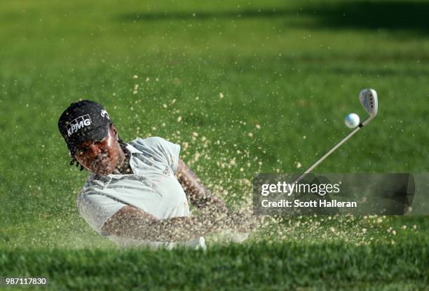 Mariah Stackhouse plays a bunker shot on the fifth hole during the second round of the KPMG Women's PGA Championship at Kemper Lakes Golf Club on...