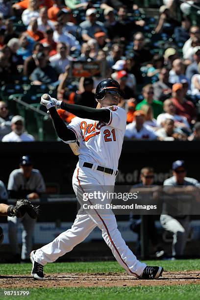 Outfielder Nick Markakis of the Baltimore Orioles swings at a pitch during the bottom of the second inning of a game on April 14, 2010 against the...