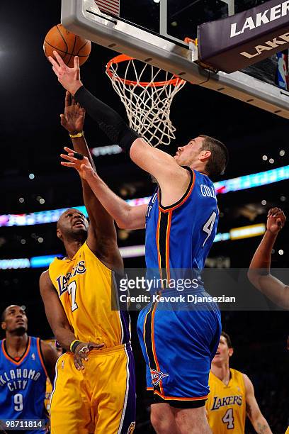 Nick Collison of the Oklahoma City Thunder goes up for a shot against Lamar Odom of the Los Angeles Lakers during Game Five of the Western Conference...