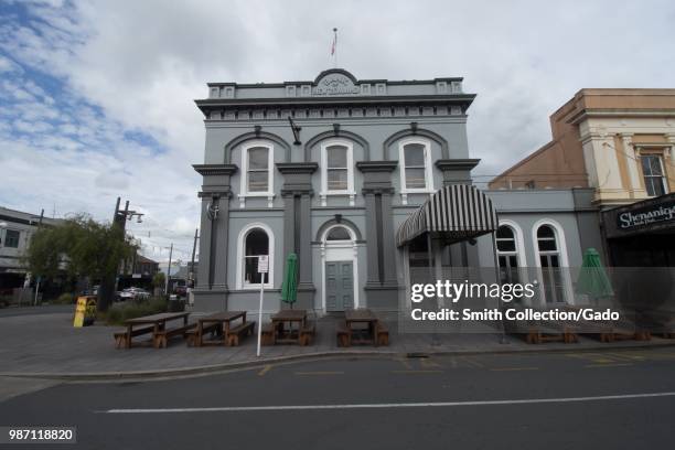 Historic Bank of New Zealand building on an overcast day in Hamilton, New Zealand, November, 2017.