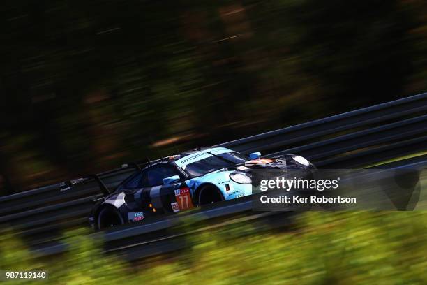 The Dempsey Proton Racing Porsche 911 RSR of Matteo Cairoli, Giorgio Roda and Khaled Al Qubaisi drives during practice for the Le Mans 24 Hour race...