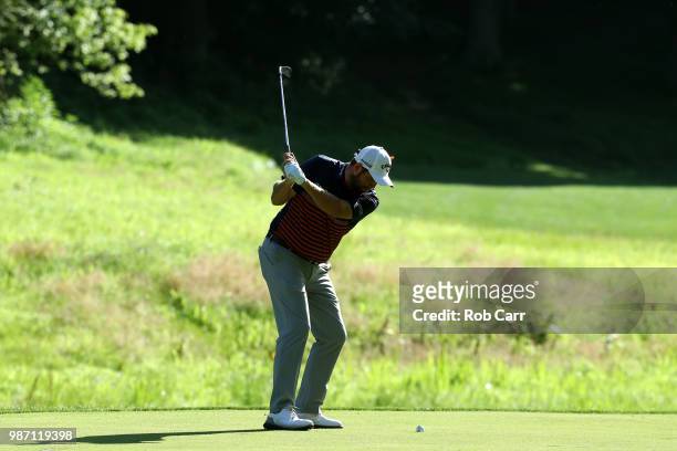Marc Leishman of Australia plays a shot on the 11th hole during the second round of the Quicken Loans National at TPC Potomac on June 29, 2018 in...