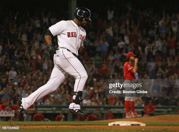 Boston Red Sox center fielder Jackie Bradley Jr. Rounds first base after his two-run home run in the seventh inning. The Boston Red Sox host the Los...