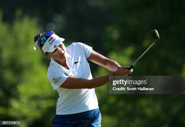 Lexi Thompson hits her second shot on the first hole during the second round of the KPMG Women's PGA Championship at Kemper Lakes Golf Club on June...
