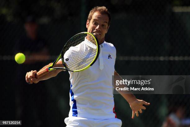 Richard Gasquet of France plays a backhand against Frances Tiafoe of USA during the GANT Tennis Championships on June 29, 2018 in London, England.