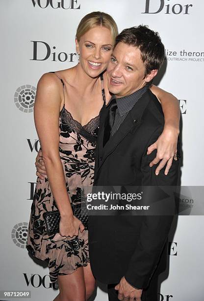 Actress Charlize Theron and actor Jeremy Renner arrive to the Charlize Theron Africa Outreach Project Dinner hosted by Dior and Vogue at Soho House...