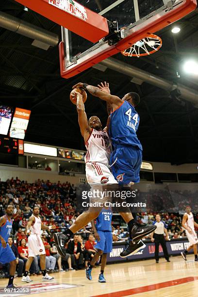 Will Conroy of the Rio Grande Valley Vipers is fouled while shooting by DeVon Hardin of the Tulsa 66ers in Game Two of the 2010 NBA D-League Finals...