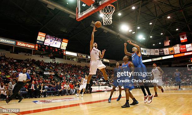 Will Conroy of the Rio Grande Valley Vipers shoots while Larry Owens, Wink Adams and Deron Washington of the Tulsa 66ers watch in Game Two of the...