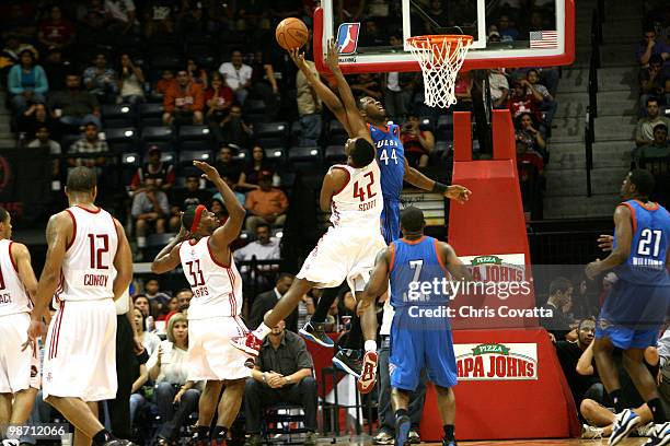 DeVon Hardin of the Tulsa 66ers is fouled while shooting by Ernest Scott of the Rio Grande Valley Vipers in Game Two of the 2010 NBA D-League Finals...