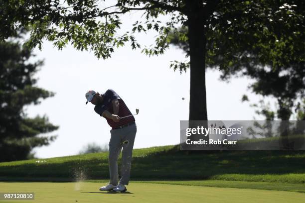 Marc Leishman of Australia plays a shot on the 15th fairway during the second round of the Quicken Loans National at TPC Potomac on June 29, 2018 in...