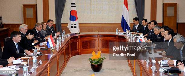 Netherands Prime Minister Jan Peter Balkenende talks with South Korean President Lee Myung-Bak prior to the summit meeting at presidential house on...