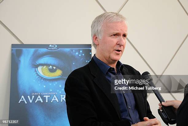 Director James Cameron gets interviewed on the blue carpet at "Is Pandora Possible?", a scientific discussion panel regarding the science and...