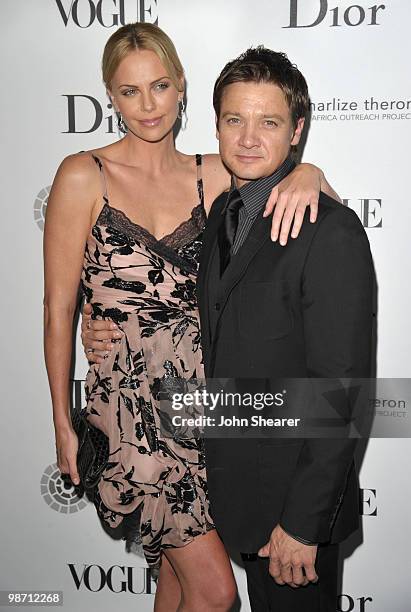 Actress Charlize Theron and actor Jeremy Renner arrive to the Charlize Theron Africa Outreach Project Dinner hosted by Dior and Vogue at Soho House...