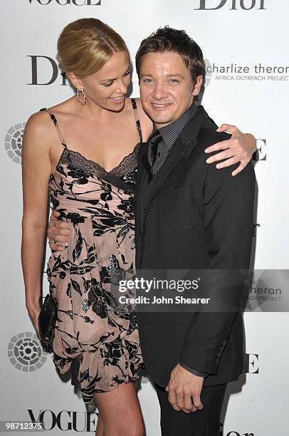 Actress Charlize Theron and actor Jeremy Renner arrive to the Charlize Theron Africa Outreach Project Dinner hosted by Dior and Vogue at Soho House...