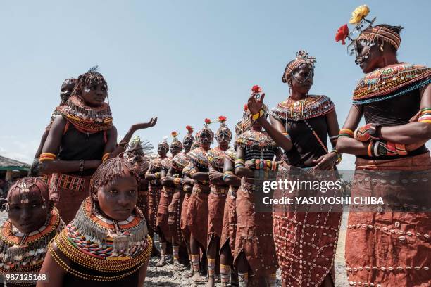 Women of Rendile tribe and Turkana tribe wait for their collaborated dance performance durIng the 11th Marsabit Lake Turkana Culture Festival in...