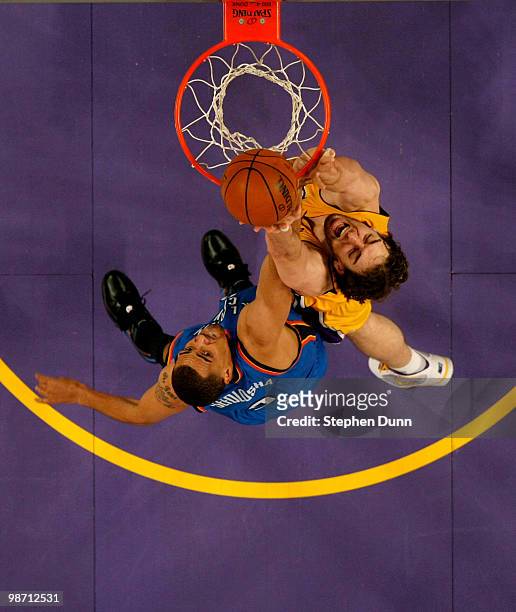 Pau Gasol of the Los Angeles Lakers shoots over Thabo Sefolosha of the Oklahoma City Thunder during Game Five of the Western Conference Quarterfinals...