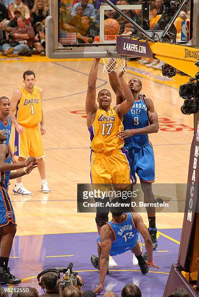 Andrew Bynum of the Los Angeles Lakers goes up for a shot against Serge Ibaka of the Oklahoma City Thunder in Game Five of the Western Conference...