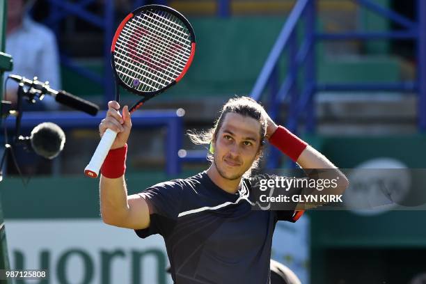 Slovakia's Lukas Lacko waves to the crowd after his win over Italy's Marco Cecchinato in their men's singles semi-final match at the ATP Nature...