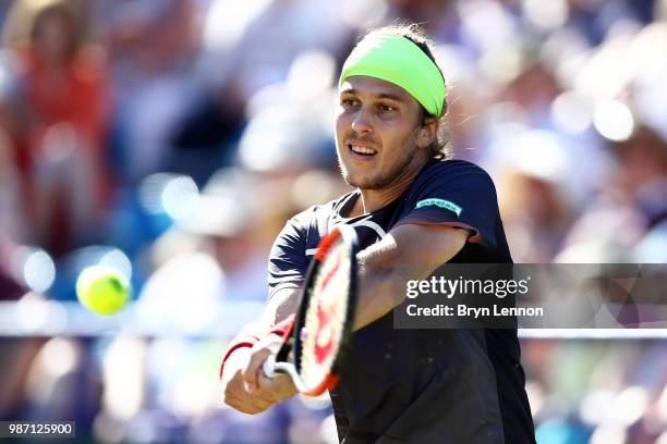 Lukas Lacko of Slovakia in action in his semi-final match against Marco Cecchinato of Italy on day eight of the Nature Valley International at...