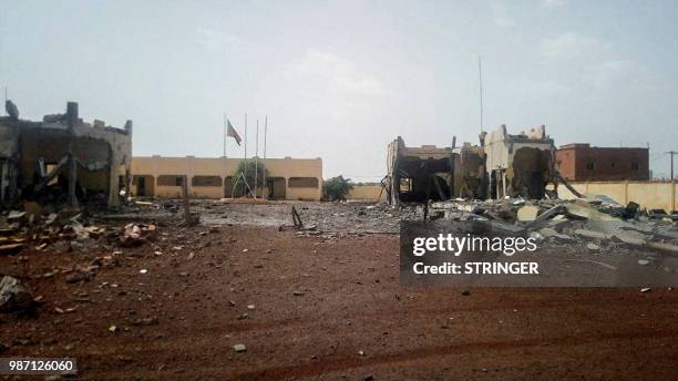 Picture taken in Sevare in central Mali, on June 29, 2018 shows debris scattered in front of the head quarter of the anti-terror task force, the G5...