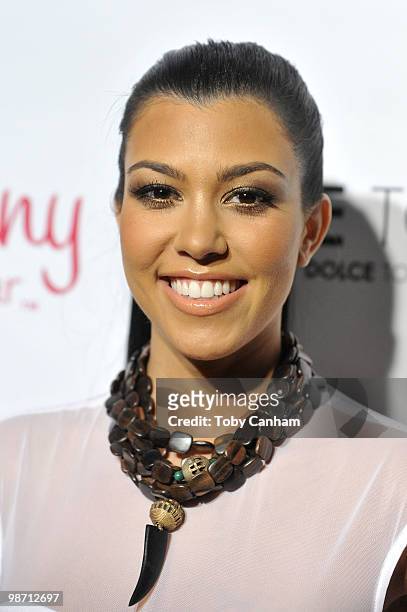 Kourtney Kardashian poses for a picture at the Beach Bunny Swimwear's grand opening party on April 27, 2010 in Los Angeles, California.