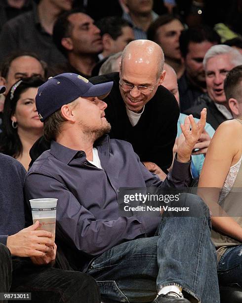 Leonardo DiCaprio talks to Jeffrey Katzenberg at a game between the Oklahoma City Thunder and the Los Angeles Lakers at Staples Center on April 27,...