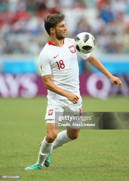 Bartosz Bereszynski of Poland controls the ball during the 2018 FIFA World Cup Russia group H match between Japan and Poland at Volgograd Arena on...