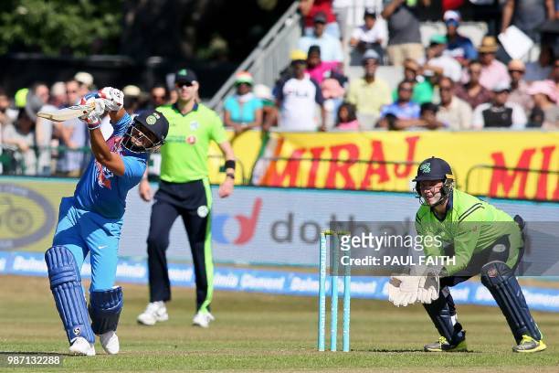 India's Suresh Raina plays a shot as Ireland's Gary Wilson keeps wicket during the Twenty20 International cricket match between Ireland and India at...