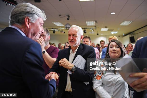 Jeremy Corbyn, Leader of the Labour Party,sits beside Labour's Parliamentary Candidate for Livingston Rhea Wolfson and Scottish Labour leader Richard...