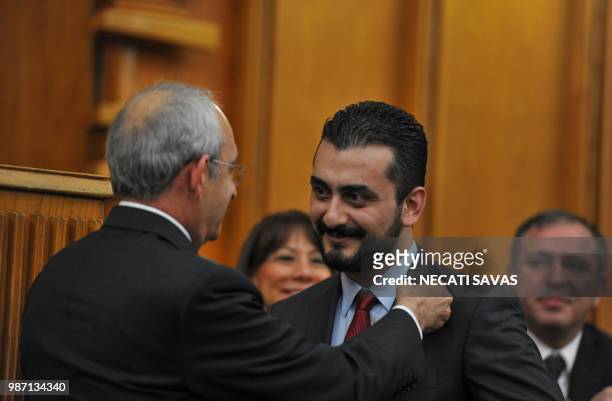 Picture taken on February 17, 2015 shows former Republican Peoples Party lawmaker Eren Erdem gesturing towards Kemal Kilicdaroglu, Turkey's main...