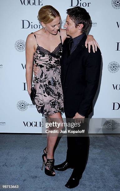 Actress Charlize Theron and actor Jeremy Renner pose at Dior & Vogue Celebrate The Charlize Theron Africa Outreach Project at Soho House on April 27,...