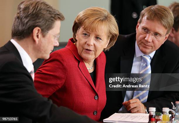 German Foreign Minister and Vice Chancellor Guido Westerwelle, German Chancellor Angela Merkel and Minister of the Chancellery Ronald Pofalla attend...