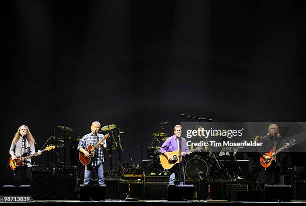 Timothy B. Schmit, Don Henley, Glenn Frey, and Joe Walsh of The Eagles perform part of the bands' Long Road Out of Eden Tour at Arco Arena on April...