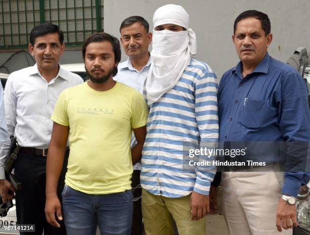 Delhi Police crime branch arrested two notorious criminals i.e. Himanshu Gujjar and Vikas Gujjar at Police Headquarters, on June 29, 2018 in New...