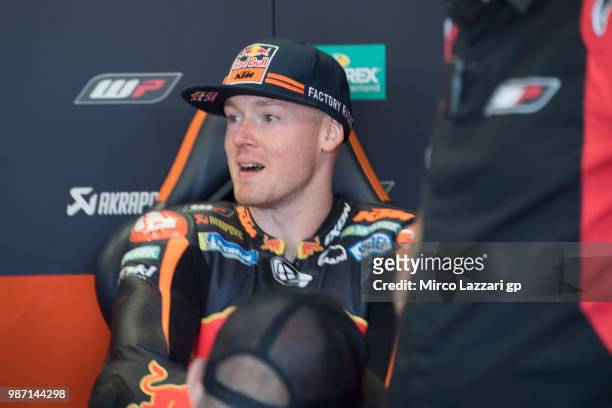 Bradley Smith of Great Britain and Red Bull KTM Factory Racing speaks in box during the MotoGP Netherlands - Free Practice on June 29, 2018 in Assen,...