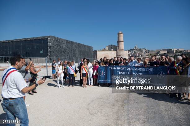 Rassemblement National far-right members take part in a rally against the Aquarius rescue vessel, chartered by French NGO SOS-Mediterranee and...