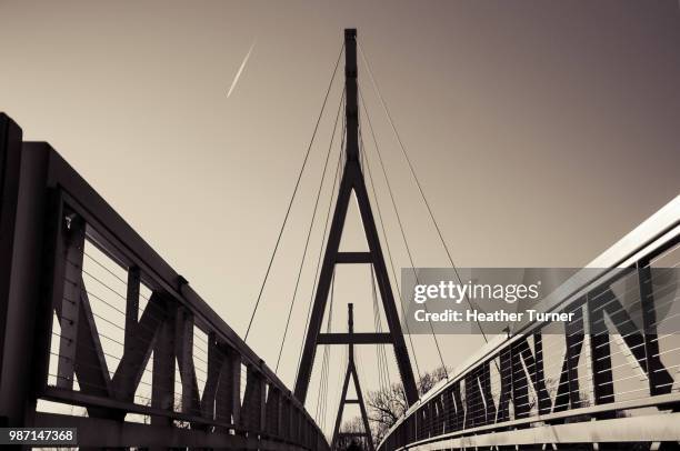 pedestrian bridge, charles city, iowa - heather charles stock pictures, royalty-free photos & images