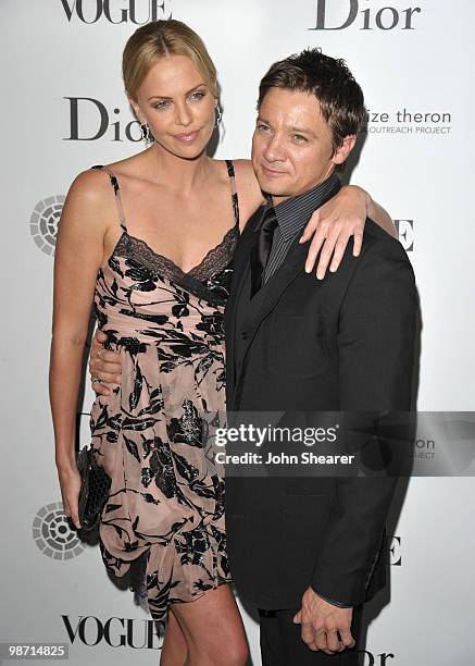 Actress Charlize Theron and actor Jeremy Renner arrive to the Charlize Theron Africa Outreach Project Dinner hosted by Dior and Vogue at Soho House...