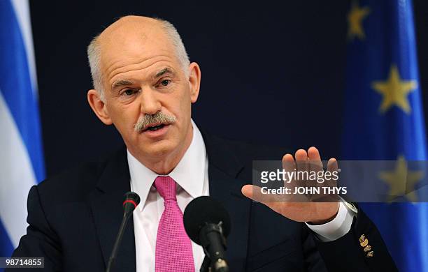 Greek Prime Minister George A. Papandreou speaks during a press conference at the European Union summit at the European Council headquarters on March...