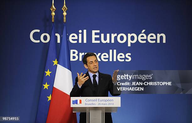 French President Nicolas Sarkozy speaks during a press conference at the European Union summit at the European Council headquarters on March 26, 2010...