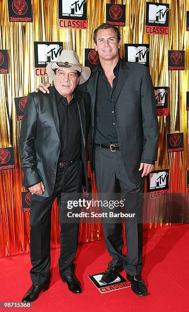 Music commentator Molly Meldrum and AFL player Wayne Carey arrives at the "MTV Classic: The Launch" music event at the Palace Theatre on April 28,...