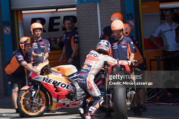 Dani Pedrosa of Spain and Repsol Honda Team tests the change of bikes in front of box during the MotoGP Netherlands - Free Practice on June 29, 2018...