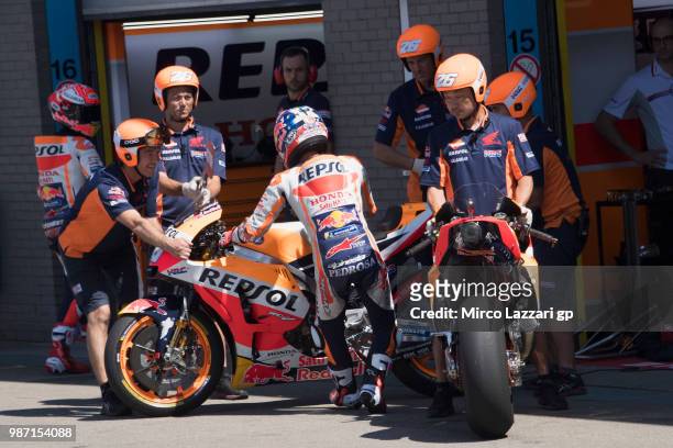 Dani Pedrosa of Spain and Repsol Honda Team tests the change of bikes in front of box during the MotoGP Netherlands - Free Practice on June 29, 2018...